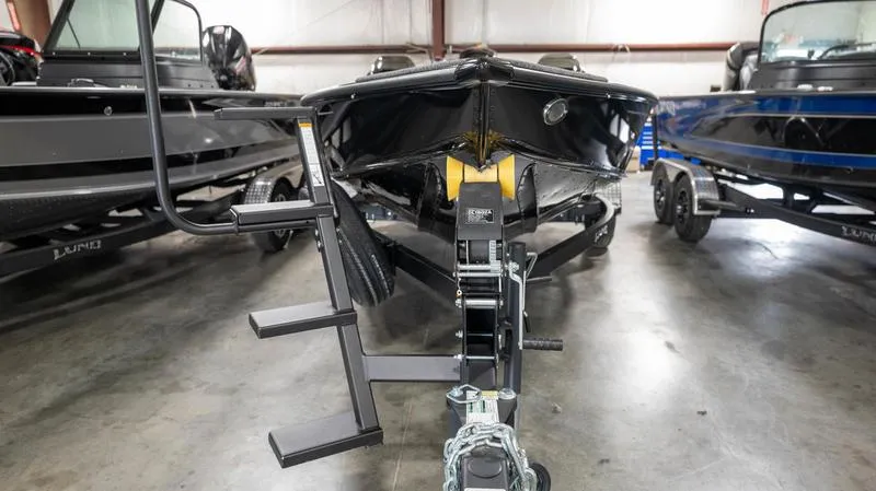 Slide: The Image of 2024 Lund 1875 Pro-V Bass XS boat on trailer in showroom. - 4