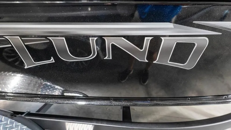 Slide: The Image of 2024 Lund 1875 Pro-V Bass XS boat close-up logo. - 5