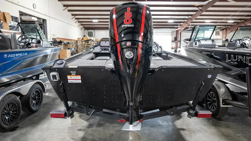 Slide: The Image of 2024 Lund 1875 Pro-V Bass XS boat with 150 HP engine in showroom. - 9