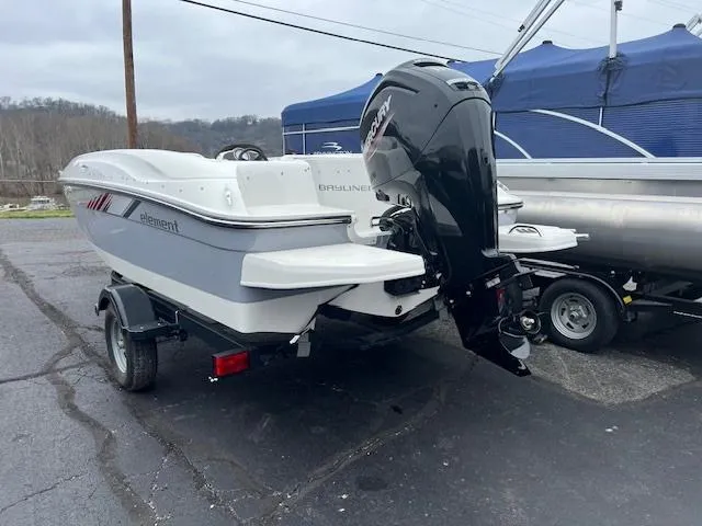Slide: The Image of 2023 Bayliner Element E18 boat with Mercury outboard motor on trailer. - 3