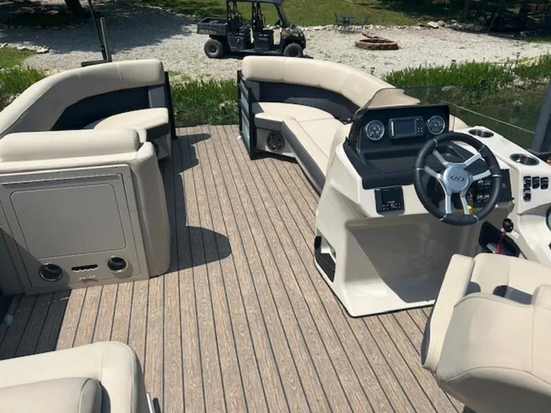 Slide: The Image of Interior of 2024 Harris Cruiser 230 SL with luxurious seating. - 6