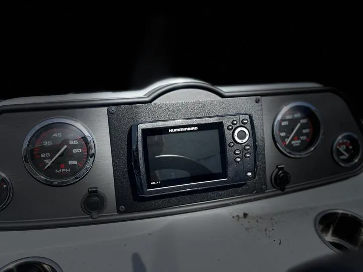 Slide: The Image of Dashboard of 2024 Bentley Pontoons LE 180 3 PT with Humminbird display. - 17
