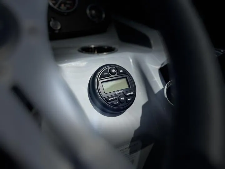 Slide: The Image of Close-up of 2024 Bentley Pontoons LE 180 3 PT dashboard controls. - 19