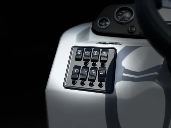Slide: The Image of Control panel of 2024 Bentley Pontoons LE 180 3 PT boat with switches and gauges. - 21