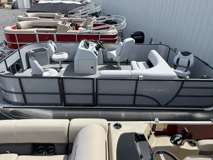 Slide: The Image of 2024 Bentley Pontoons LE 180 3 PT pontoon boat in a showroom. - 3