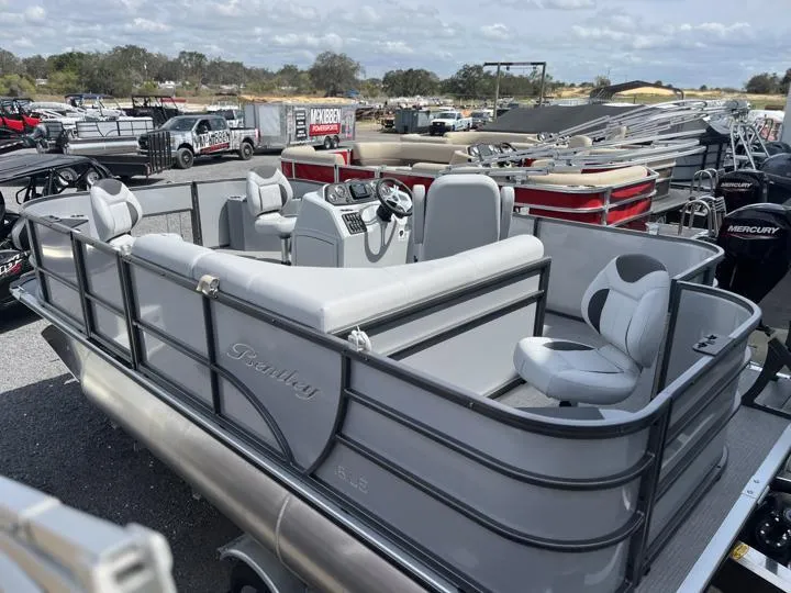 Slide: The Image of 2024 Bentley Pontoons LE 180 3 PT pontoon boat in a dealership lot. - 4