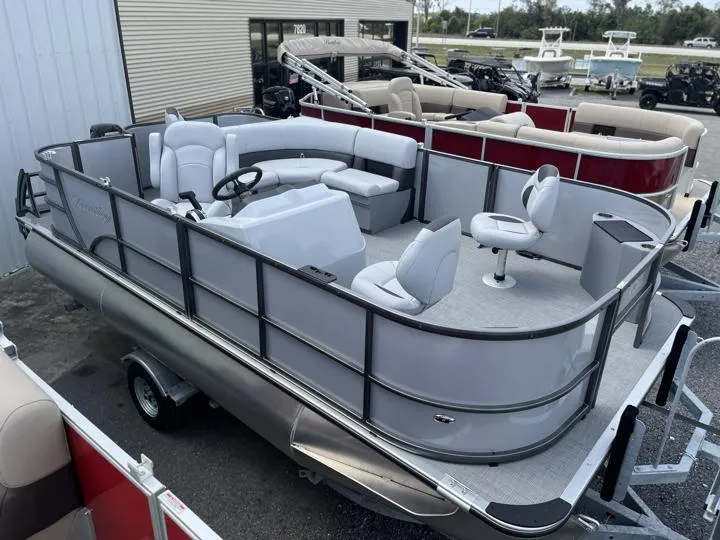 Slide: The Image of 2024 Bentley Pontoons LE 180 3 PT pontoon boat with spacious seating and modern design. - 8