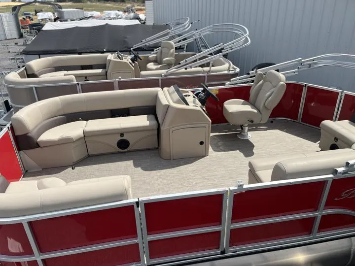 Slide: The Image of 2024 Bentley Pontoons LE 180 3 PT with beige seating and red exterior. - 3