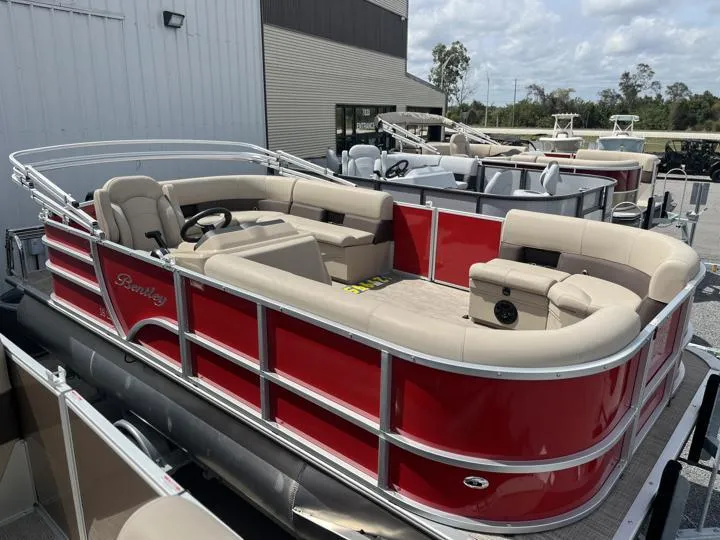 Slide: The Image of 2024 Bentley Pontoons LE 180 3 PT, red pontoon boat with beige seating. - 8