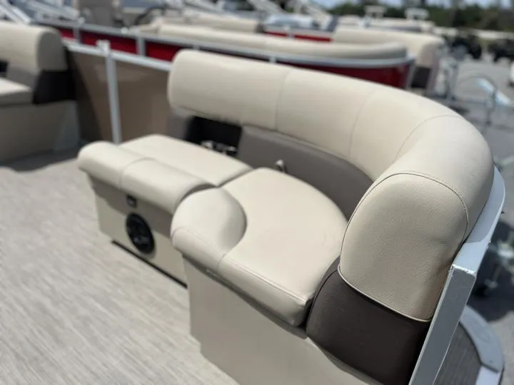 Slide: The Image of 2024 Bentley Pontoons LE 180 CR, beige and brown seating area. - 10