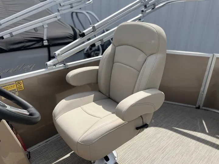 Slide: The Image of 2024 Bentley Pontoons LE 180 CR captain's chair in beige upholstery. - 13