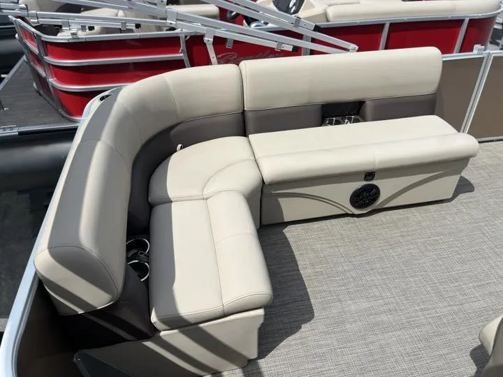 Slide: The Image of 2024 Bentley Pontoons LE 180 CR interior seating with beige upholstery. - 14