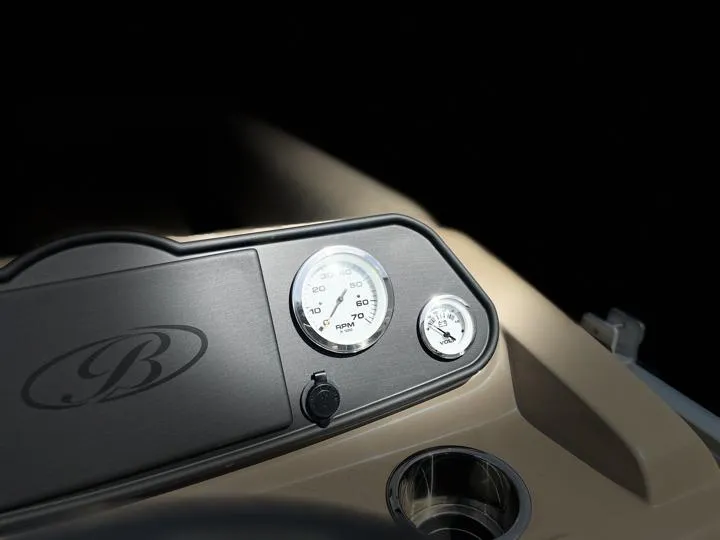 Slide: The Image of 2024 Bentley Pontoons LE 180 CR dashboard with speedometer and fuel gauge. - 21