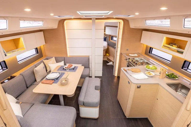 Slide: The Image of Modern interior of 2024 Dufour 41 yacht with kitchen and dining area. - 11