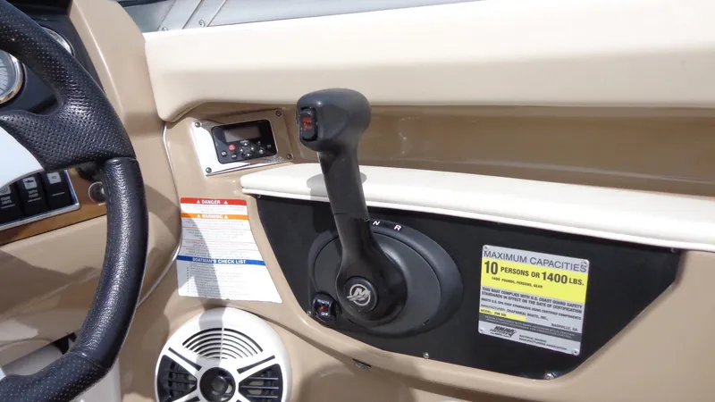 Slide: The Image of Control panel of a 2011 Chaparral 206 SSi boat with capacity label. - 11