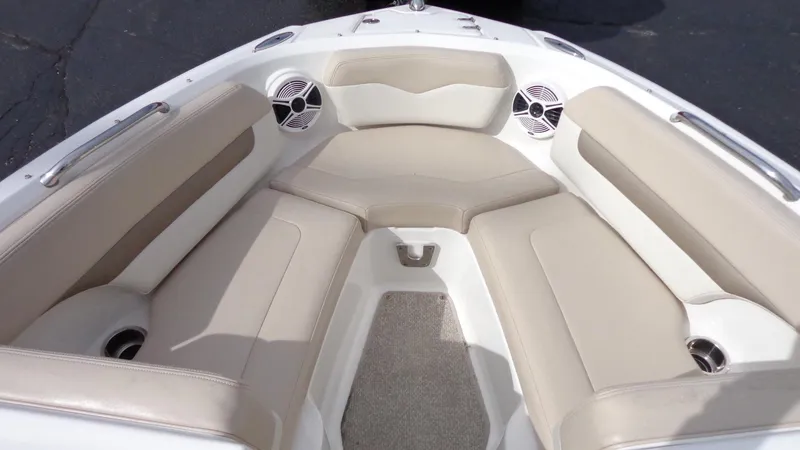Slide: The Image of 2011 Chaparral 206 SSi boat interior with beige and white seating. - 15