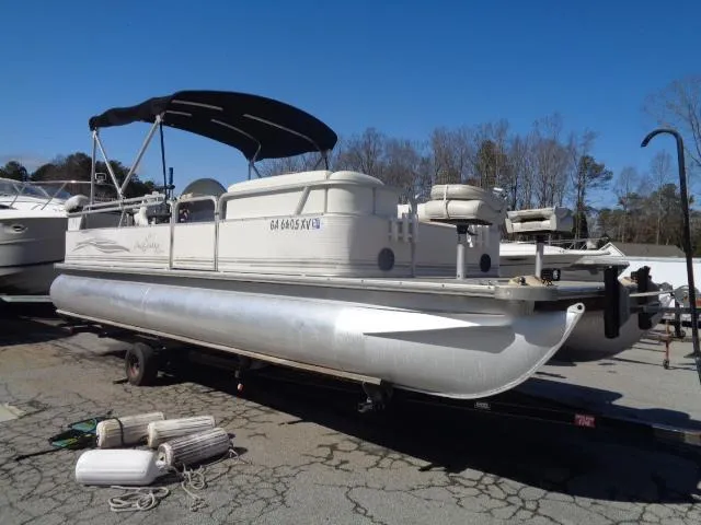 Slide: The Image of 2004 Sylvan Sunchaser 824 pontoon boat on trailer with canopy. - 1