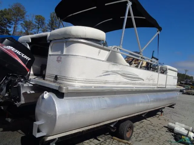 Slide: The Image of 2004 Sylvan SUNCHASER 824 pontoon boat with Mercury outboard motor. - 2