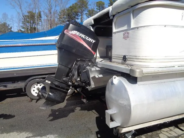 Slide: The Image of 2004 Sylvan SUNCHASER 824 pontoon boat with Mercury outboard motor. - 28