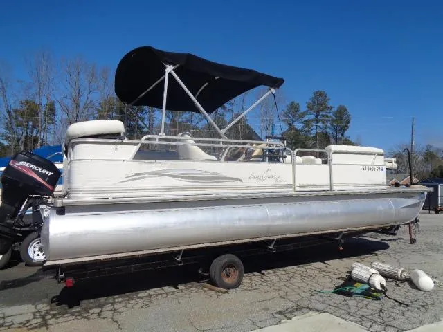 Slide: The Image of 2004 Sylvan SUNCHASER 824 pontoon boat with black canopy on trailer. - 9