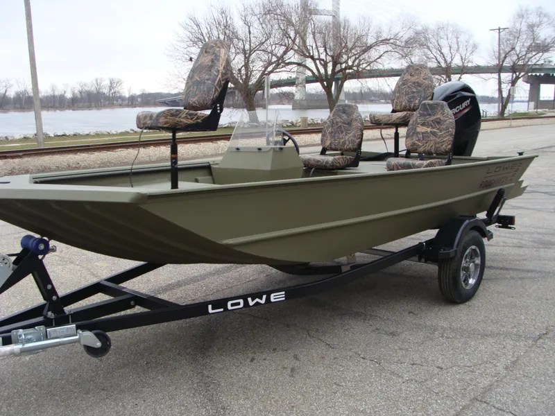 Slide: The Image of 2023 Lowe RX 1660 SC fishing boat on trailer with camo seats. - 4