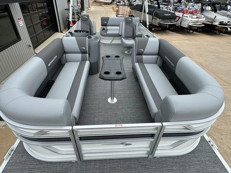 Slide: The Image of 2024 Bennington 22 S Swingback pontoon boat with spacious seating and modern design. - 11