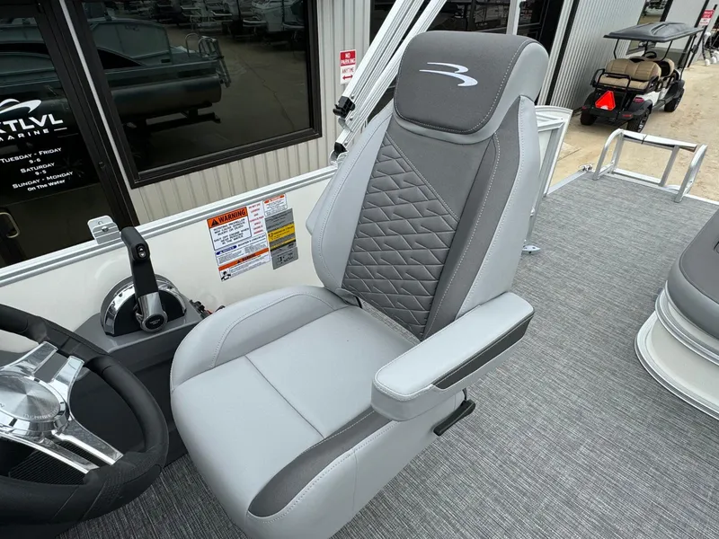 Slide: The Image of Captain's chair on 2024 Bennington 22 S Swingback pontoon boat, featuring sleek design and comfort. - 25