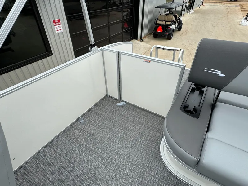Slide: The Image of 2024 Bennington 22 S Swingback boat interior with seating and safety gate. - 27