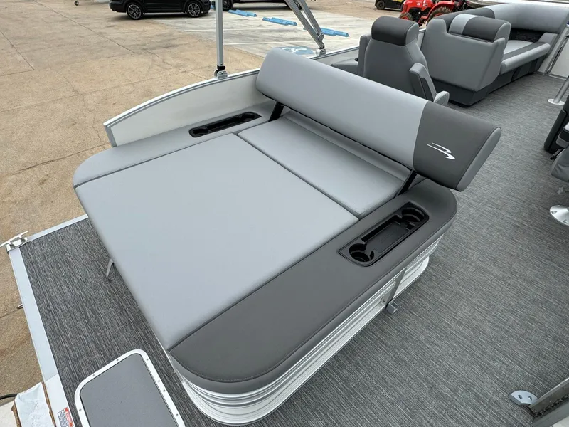 Slide: The Image of 2024 Bennington 22 S Swingback boat with gray seating and cup holders. - 29