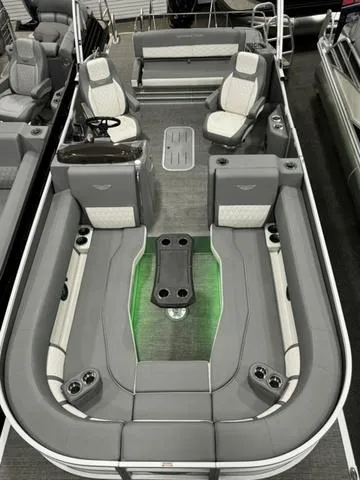 Slide: The Image of 2024 Bennington 25 LTSB pontoon boat interior with luxurious seating and modern design. - 26