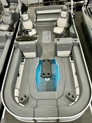Slide: The Image of 2024 Bennington 25 LTSB pontoon boat with luxurious seating and modern design. - 27