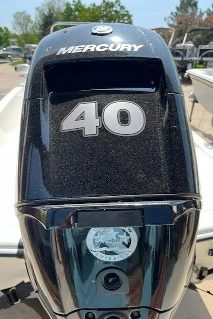 Slide: The Image of 2024 Mako Pro Skiff 15 CC with Mercury 40 HP outboard motor. - 11