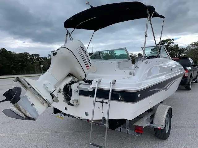 Slide: The Image of 2004 Hurricane 187SD boat powered with outboard motor, Johnson Evinrude J150BXSR - 10
