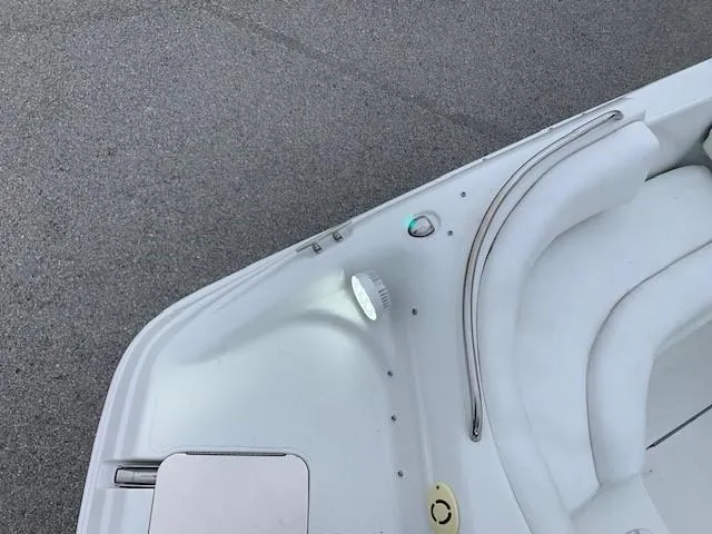 Slide: The Image of 2004 Hurricane 187SD boat powered with outboard motor, Johnson Evinrude J150BXSR with new Upholstery and new LED Lights. - 12