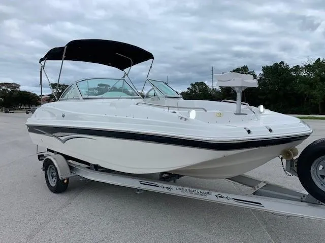 Slide: The Image of 2004 Hurricane 187SD boat powered with outboard motor, Johnson Evinrude J150BXSR - 5
