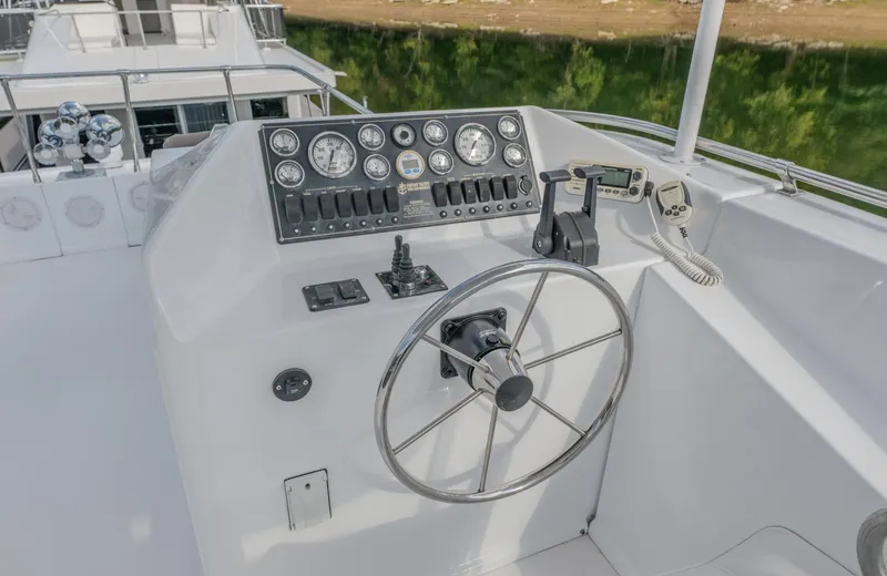 Slide: The Image of Steering wheel and control panel of 2007 Fantasy 19 X 90 yacht. - 11