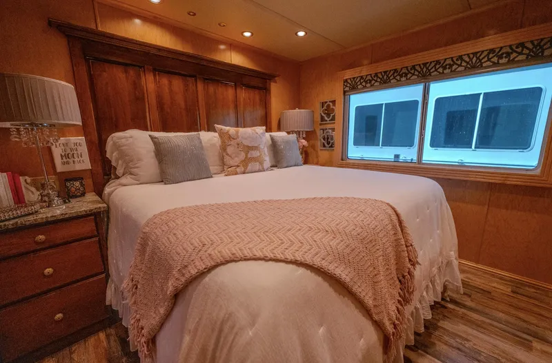 Slide: The Image of Cozy bedroom in 2007 Fantasy 19 X 90 houseboat with elegant decor and large window. - 30