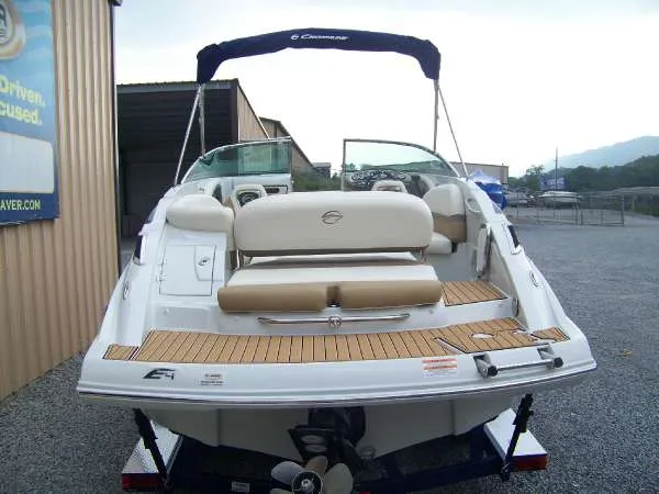 Slide: The Image of 2016 Crownline E4 boat with teak deck, parked outdoors. - 4