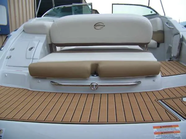 Slide: The Image of 2016 Crownline E4 boat with teak deck and cushioned seating. - 6