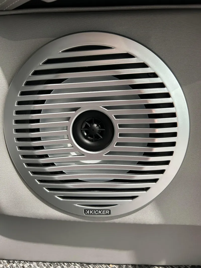 Slide: The Image of 2024 Bennington 27 QFBA boat Kicker speaker close-up. - 12