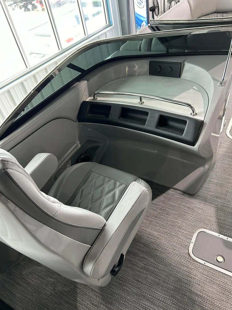 Slide: The Image of 2024 Bennington 27 QFBA boat interior with luxurious seating and modern design. - 6