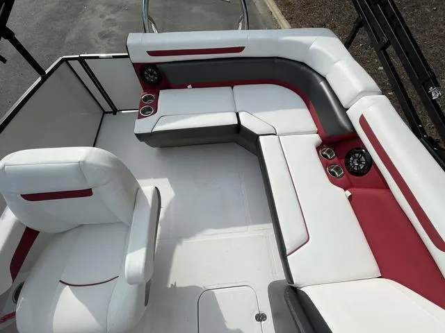 Slide: The Image of 2023 Hurricane FunDeck 1960 REF OB boat interior with white and red seating. - 10