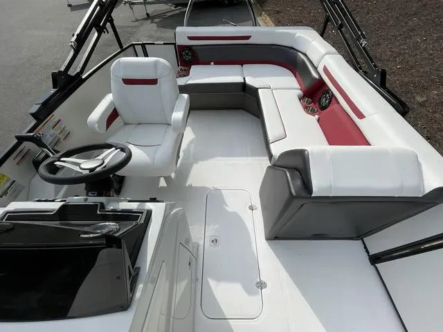 Slide: The Image of 2023 Hurricane FunDeck 1960 REF OB boat interior with white and red seating. - 9