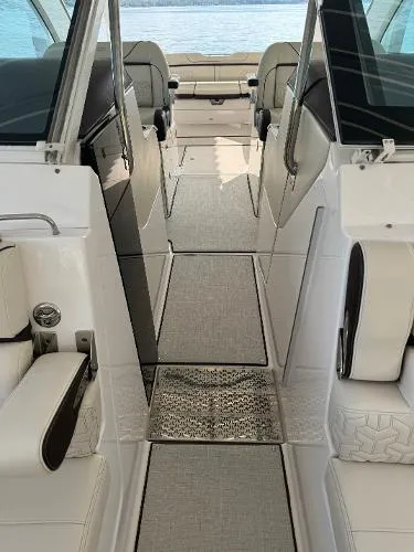 Slide: The Image of 2023 Regal LS36 boat interior with luxurious seating and modern design. - 15