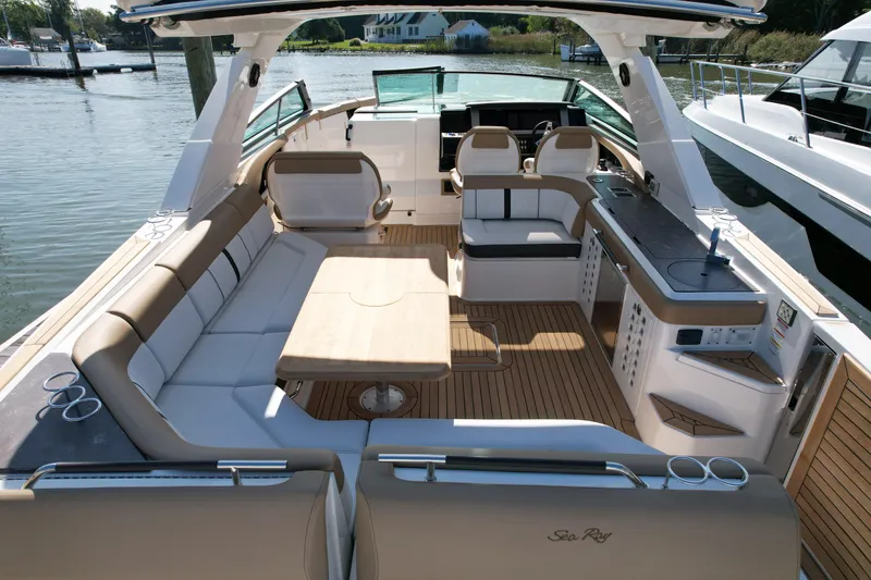 Slide: The Image of Luxurious 2019 Sea Ray SLX 400 boat interior with spacious seating and modern amenities. - 10