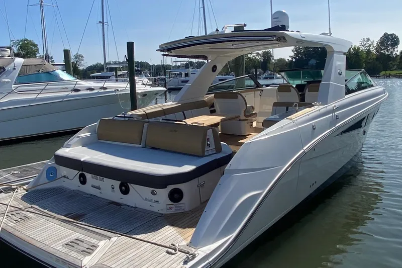 Slide: The Image of 2019 Sea Ray SLX 400 luxury yacht docked at marina. - 3