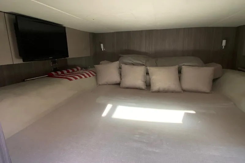 Slide: The Image of Interior of 2019 Sea Ray SLX 400 yacht with modern seating and entertainment area. - 40