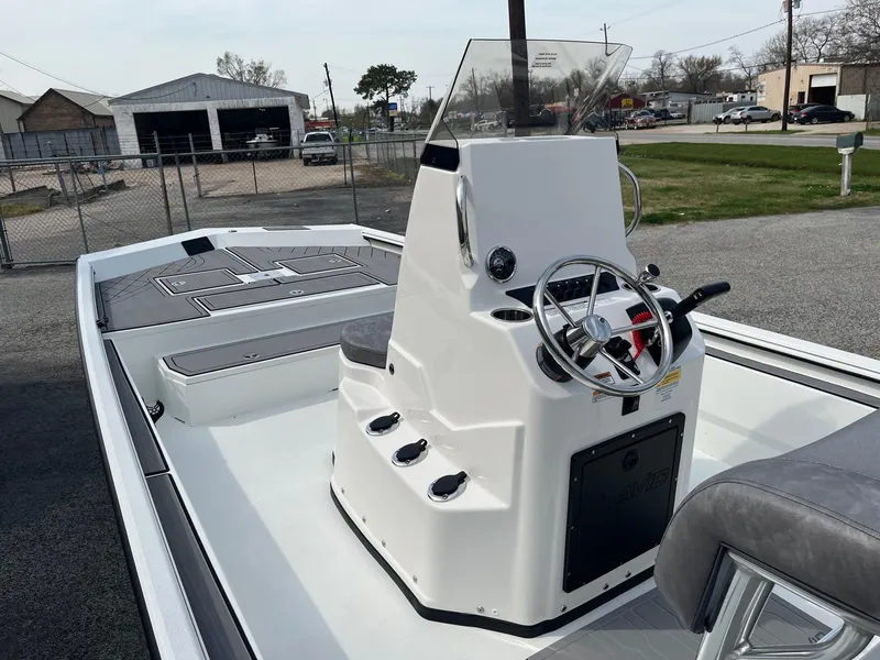 Slide: The Image of 2024 Avid 20 Rogue boat with center console and steering wheel. - 5
