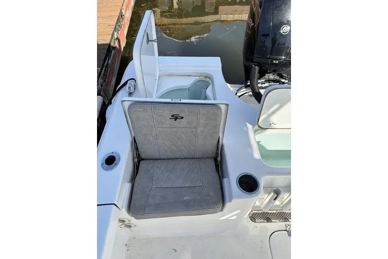 Slide: The Image of 2023 Sea Pro 208 Bay boat seat with storage compartment and cup holder. - 38