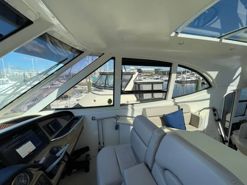 Slide: The Image of Interior view of 2001 Carver 506 Motor Yacht with marina in background. - 6